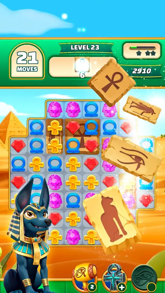 Gods & Gems, Level 23: Papyrus-Tafeln fliegen zum Levelziel, am Rand eine Schakalfigur